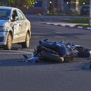 Road accident featuring a car and motorcycle, represent essential steps in Kentucky - Leonard Law Firm