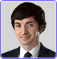 Headshot of attorney offering free assessment.
