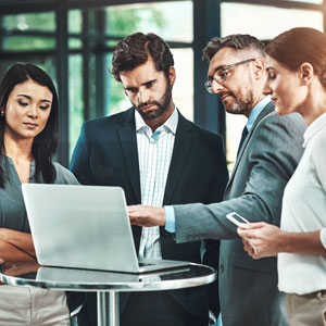 Image emphasizing teamwork and professional interaction in a law firm -  Leonard Law Firm