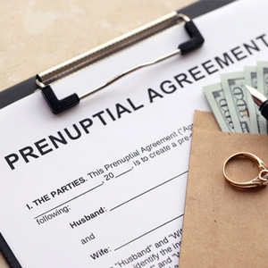 Prenuptial agreement, cash, and ring for joint business ownership divorce in Kentucky.